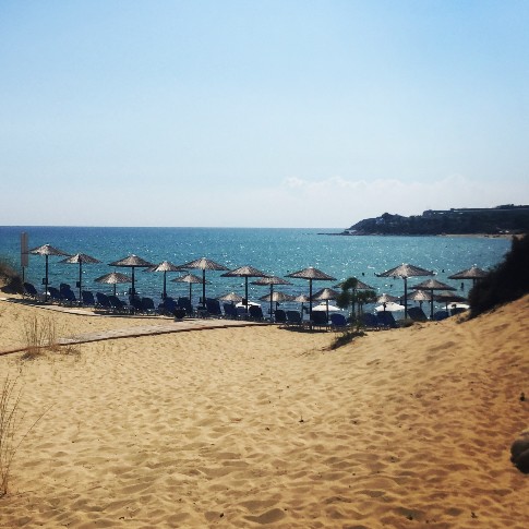 Sand, umbrellas, sea
