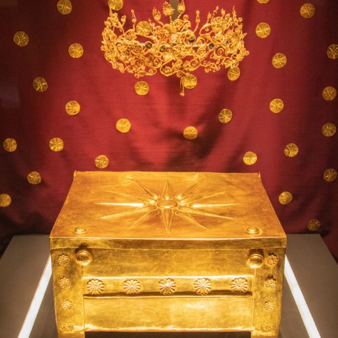 Gold box with an engraved sun