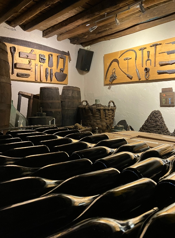 Wine cellar with a display of old wine tools